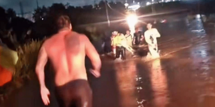 Policial de folga salva família presa em carro durante alagamento em Matupá